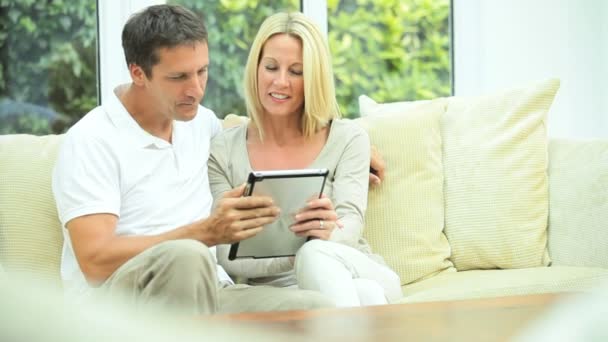 Attractive Caucasian Couple with Wireless Tablet — Stock Video