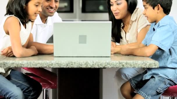 Asian Family in Kitchen with Laptop Computer — Stock Video