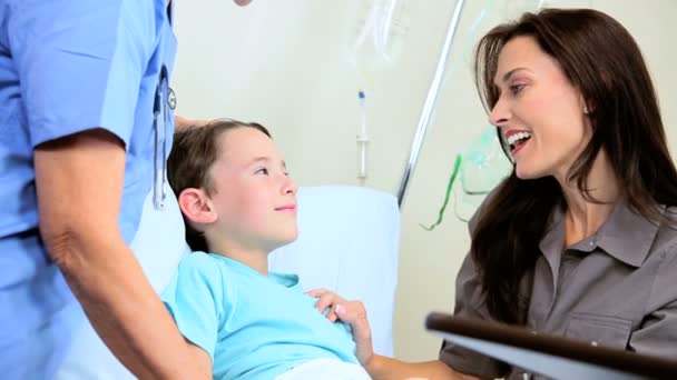 Young Child Patient with Clinic Nurse — Stock Video