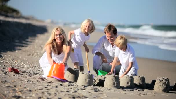 Happy Children and Parents Playing in the Sand — Stock Video