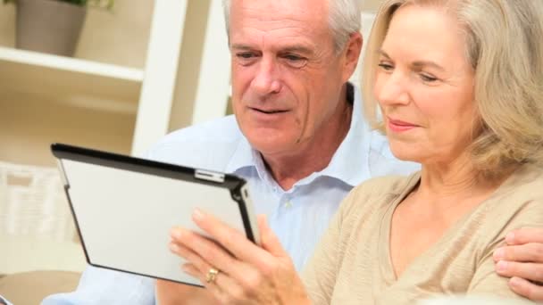 Caucasian Senior Couple at Home with a Wireless Tablet — Stock Video