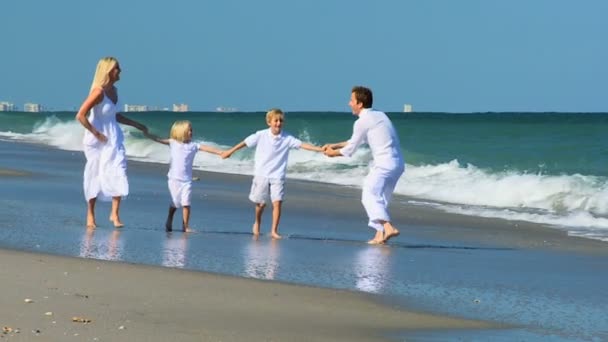 Family Running Fun on the Beach — Stock Video