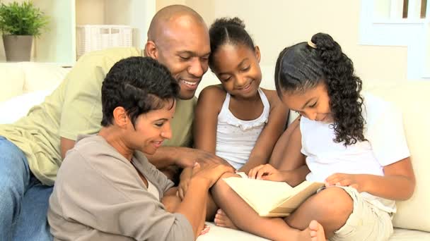 Little Ethnic Girl Reading to Family — Stock Video