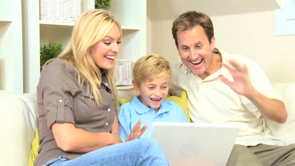 Family Using Online Web Chat Talking to Friends — Stock Video