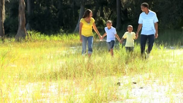 Young Ethnic Family on Parkland — Stock Video