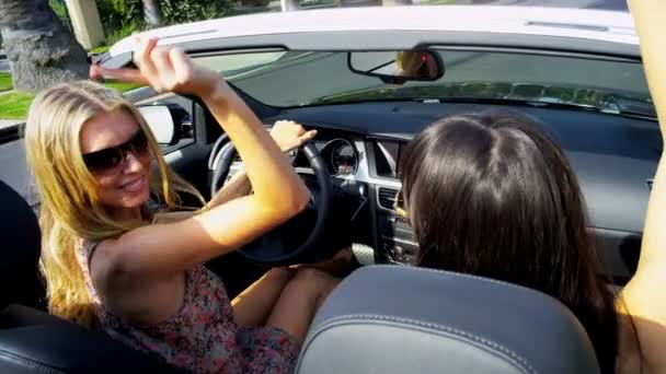 Young Girls Driving in Open Top Car — Stock Video