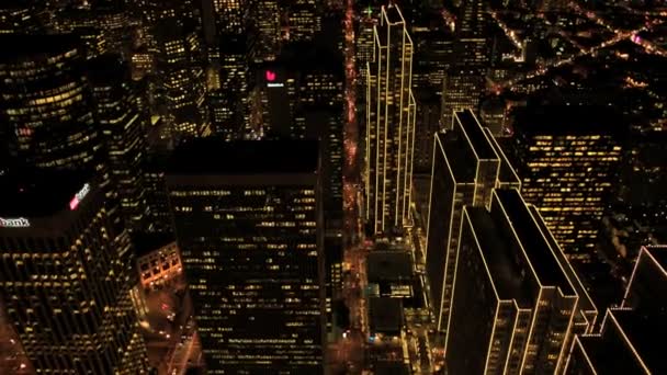 Aerial night view of illuminated city skyscrapers, USA — Stock Video