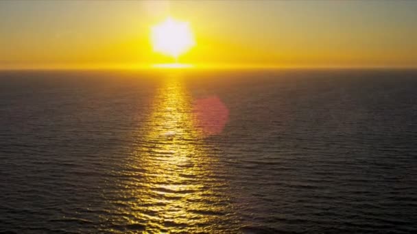 Aerial view of golden glow from setting sun, USA — Stock Video