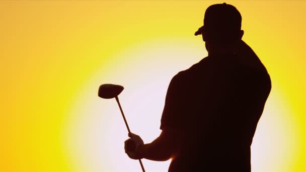 Golfer shading his eyes — Stock Video