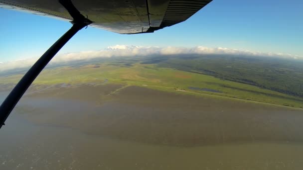 Aerial view of river melt waters swampland Wilderness landscape from light aircraft, Alaska, USA — Stock Video