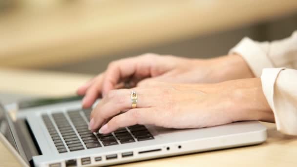 Hands of Caucasian businesswoman using computer keyboard — Stock Video