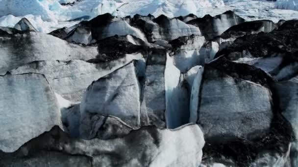 Aerial view of moraine covered icebergs from Knik Glacier, Alaska, USA — Stock Video