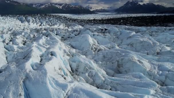 Aerial view of natures Knik Glacier moraine crevasses feeding the Knik River which empties Cook Inlet nr Anchorage Alaska, USA shot on RED EPIC — Stock Video