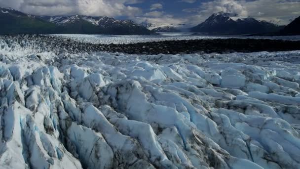 Aerial view of natures Knik Glacier moraine crevasses feeding the Knik River which empties Cook Inlet nr Anchorage Alaska, USA shot on RED EPIC — Stock Video