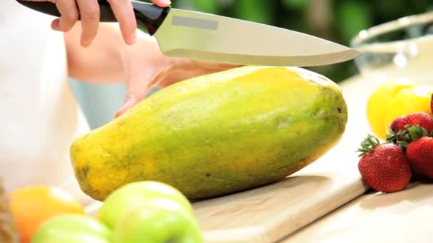 Fresh Tropical Papaya Fruit Being Sliced Hands Only — Stock Video