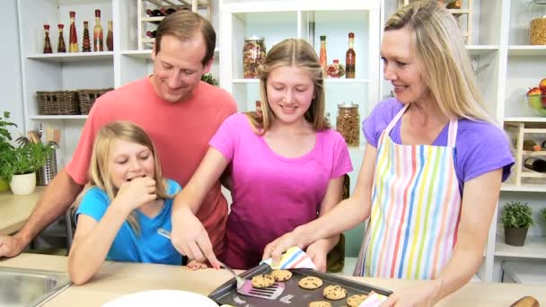 Family at kitchen making cookies — Stock Video