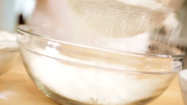 Close Up White Flour Sieved Into Bowl — Stock Video