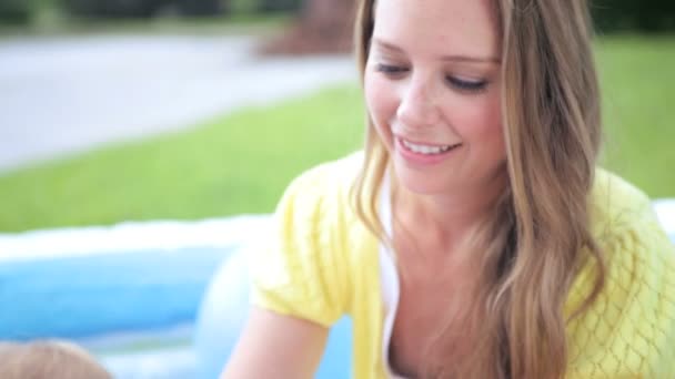 Little boy having fun playing with young mother — Stock Video