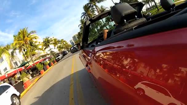 Red convertible on Ocean Drive — Stock Video