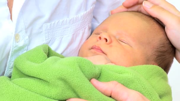 Newborn baby boy in the hands of parents — Stock Video