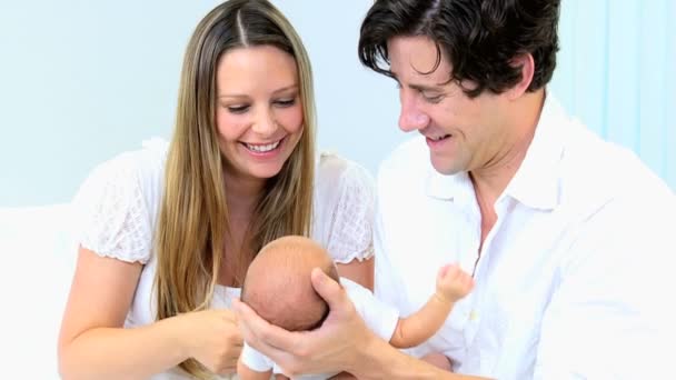 Newborn baby boy in the hands of parents — Stock Video