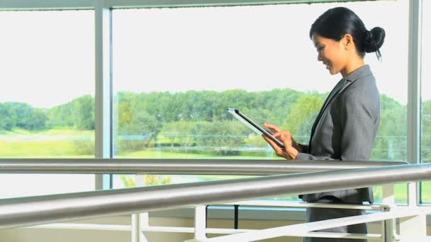 Businesswoman with tablet in airport — Stock Video