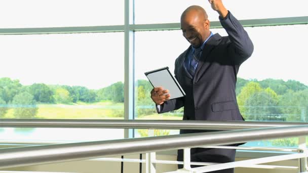 Businessman using tablet in airport — Stock Video