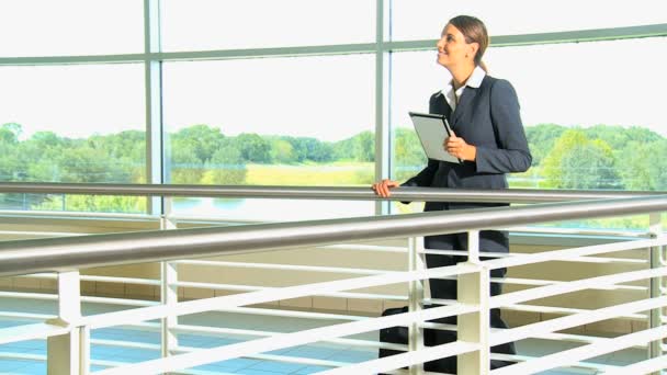 Businesswoman with tablet in airport — Stock Video