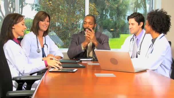 Meeting of financial advisor  with medical team in hospital boardroom — Stock Video