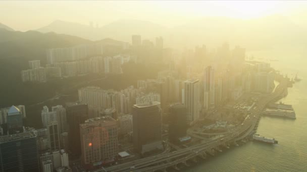 Solnedgång utsikt över Hong Kong och Kowloon — Stockvideo