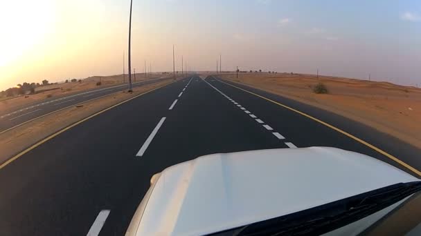 Vehicle on desert tarmac roads — Stock Video