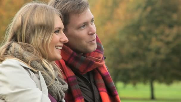 Caucasian Couple Kiss in the Park — Stock Video