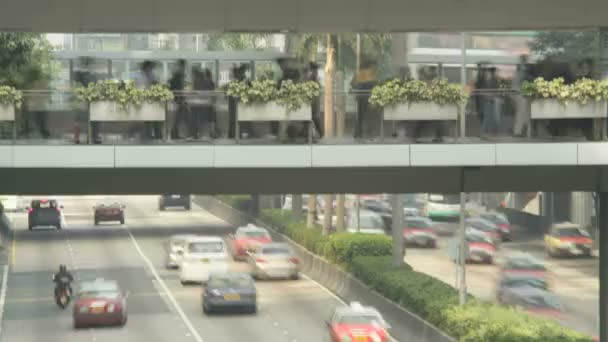 Elevated walkway above busy road traffic — Stock Video