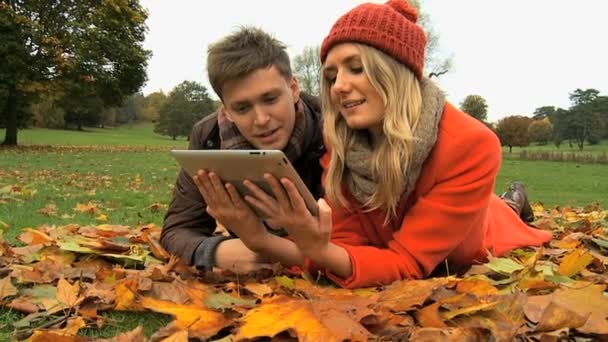 Caucasian couple on wireless tablet — Stock Video