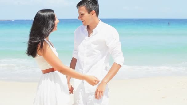 Boyfriend and girlfriend spending time on beach — Stock Video