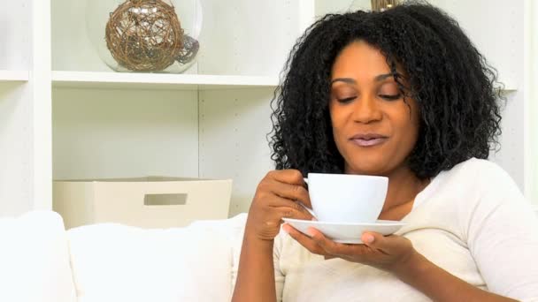 African American woman drinking coffee — Stock Video