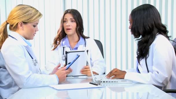 Female medical consultants having meeting in boardroom — Stock Video