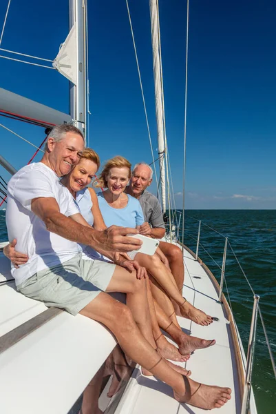 Smiling Group Senior American Friends Using Mobile Phone Photograph Fun — Stock Photo, Image