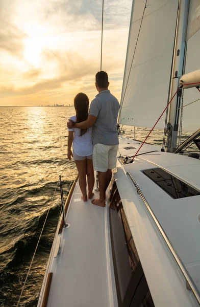 Loving Young Latino Couple Watching Sunset Horizon Luxury Yacht Sailing — Foto de Stock