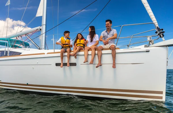 Young Hispanic Parents Children Wearing Lifejackets Private Yacht Enjoying Fun — Photo