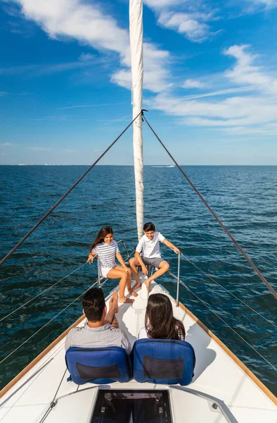 Latino Parents Young Children Sitting Bow Luxury Yacht Enjoying Freedom — Stock Photo, Image