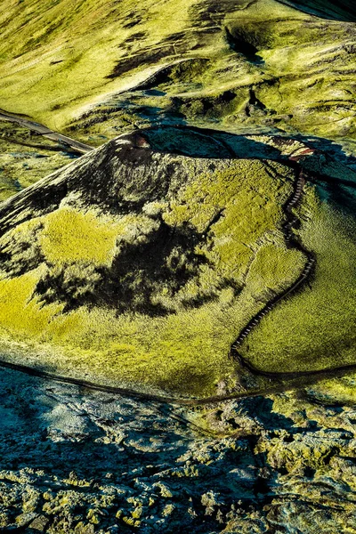 Aerial view of dormant volcano Landmannalaugar National Park Iceland in summer volcanic mountain region with extreme terrain in a remote Wilderness tourism travel