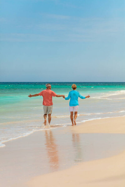 Happy Retired Caucasian Couple Enjoying Carefree Vacation Together Tropical Beach Stock Picture