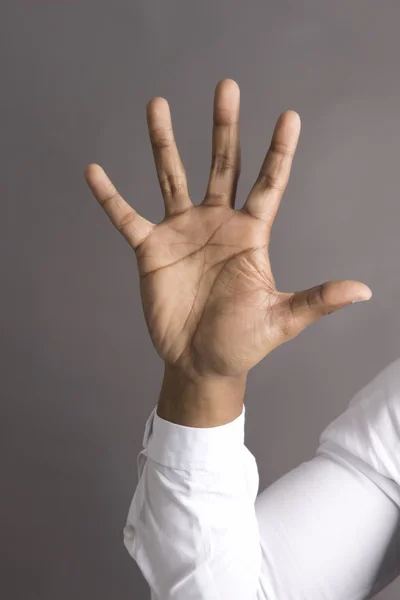 Cinque dita nere su una mano — Foto Stock