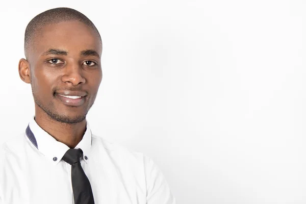 Closeup of young professional man smiling — Stock Photo, Image