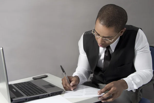 Black Man in his office behind desk — Stock Photo, Image