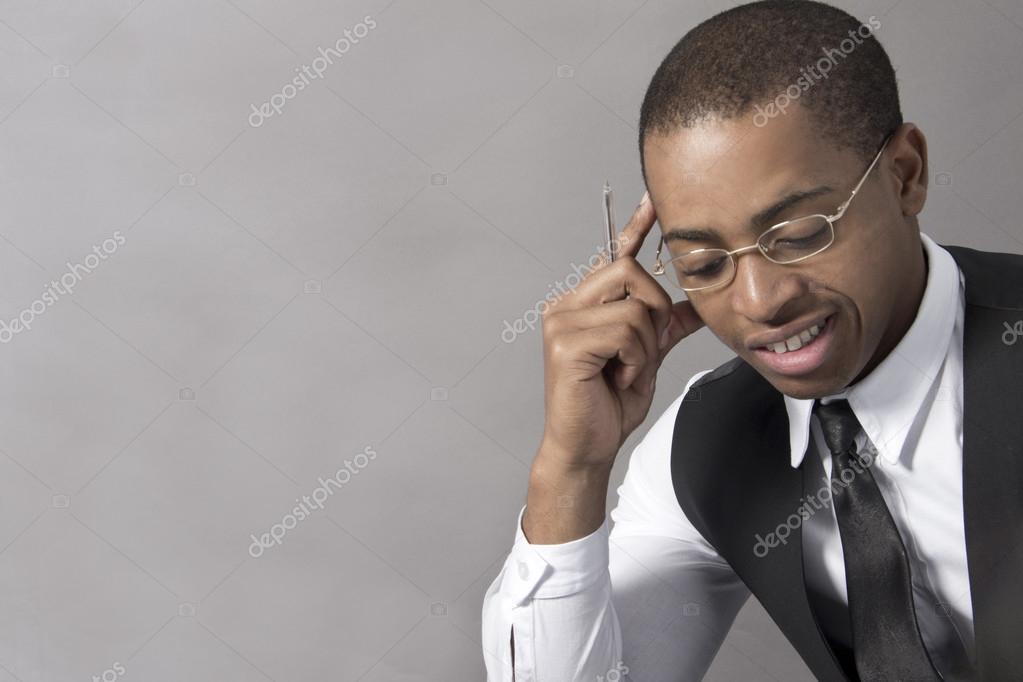 depositphotos_41664823-stock-photo-young-black-man-business-thinking.jpg