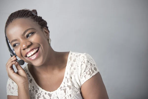 Young Black Call Centre Agent Laugh, talking