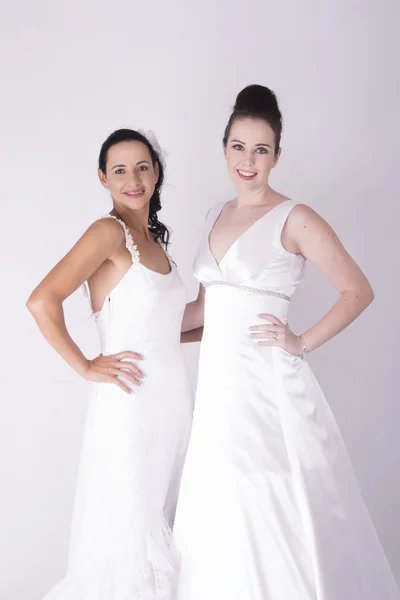 Gorgeous Brides wearing white smiling and excited — Stock Photo, Image