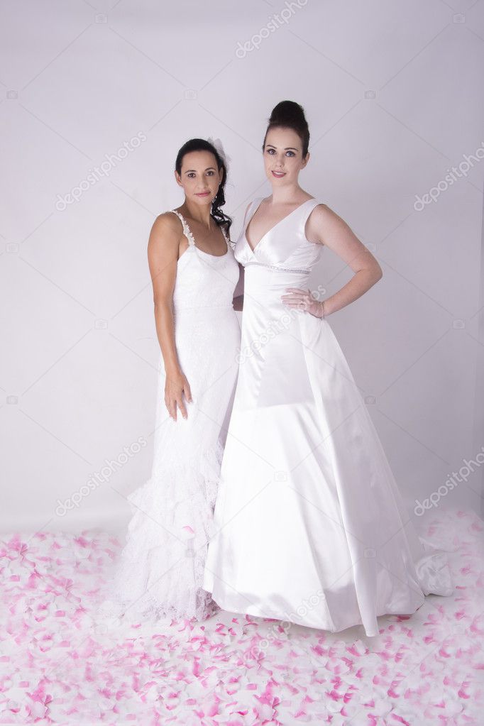 Two Gorgeous Young Brides wearing Bridal Gown